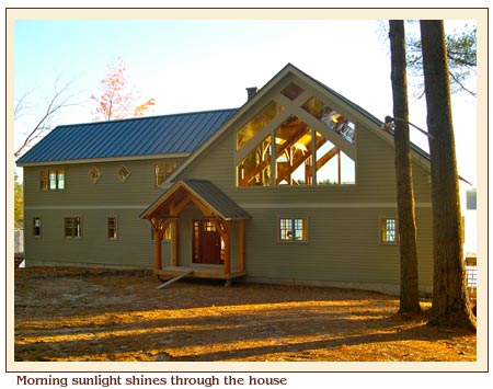 Morning sunlight on the completed waterfront house.